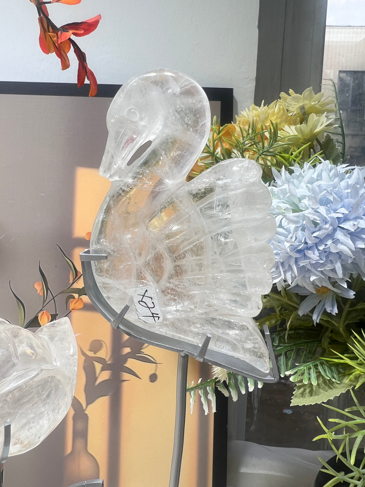 Clear quartz swan with flower